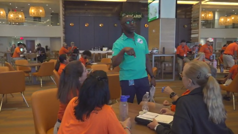 Miami Dade College professor finds his passion with side job at Hard Rock Stadium — CBS Miami, Grand Prairie Arts news