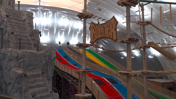 Families enjoying activities at Bolder Adventure Park before its closure.